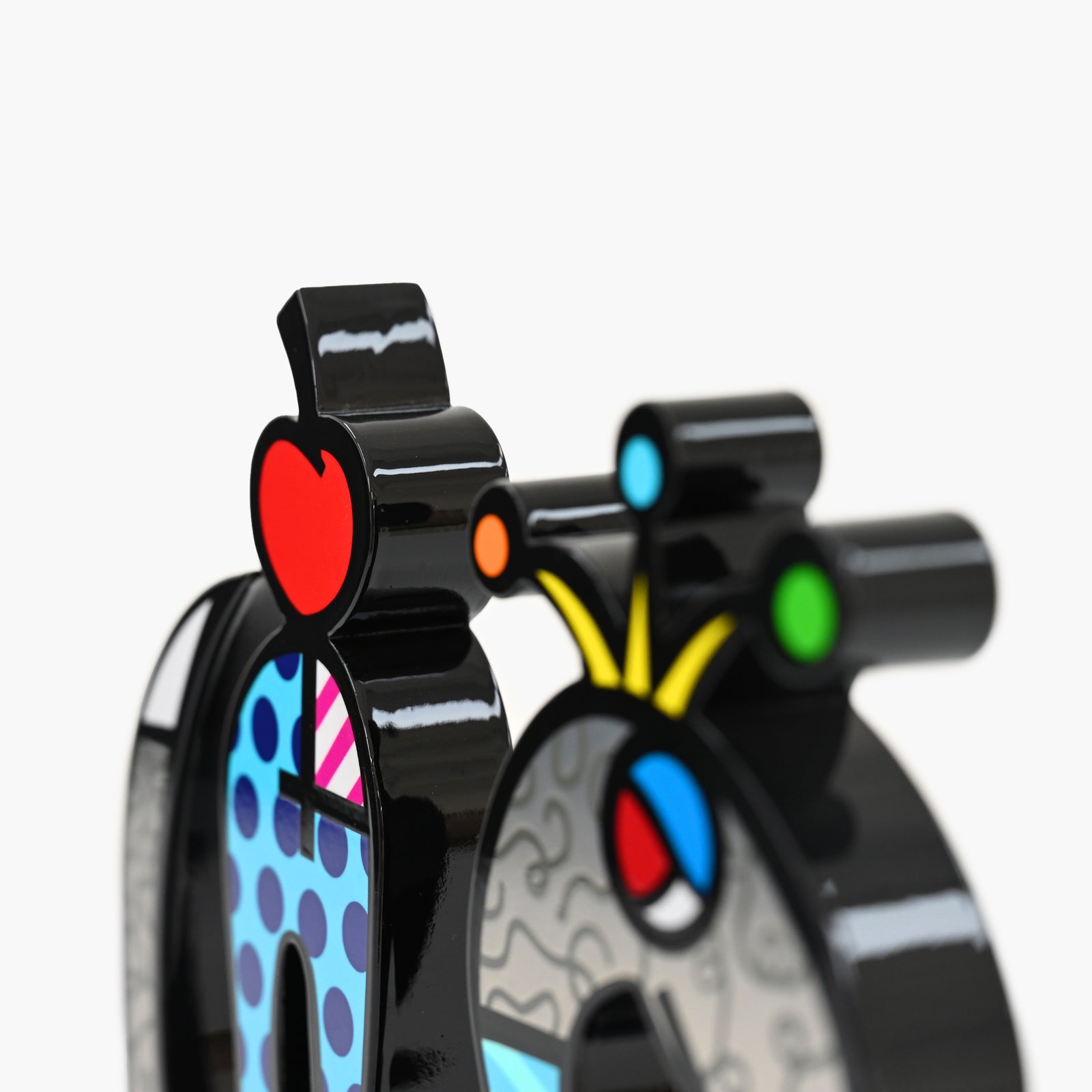 Close-up detail of Romero Britto Snake fine art sculpture showing texture and color