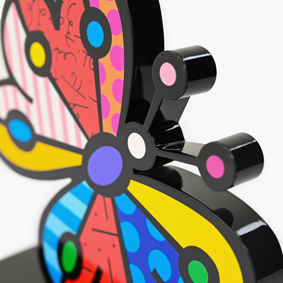 Close-up detail of Romero Britto Garden Butterfly fine art sculpture showing texture and color