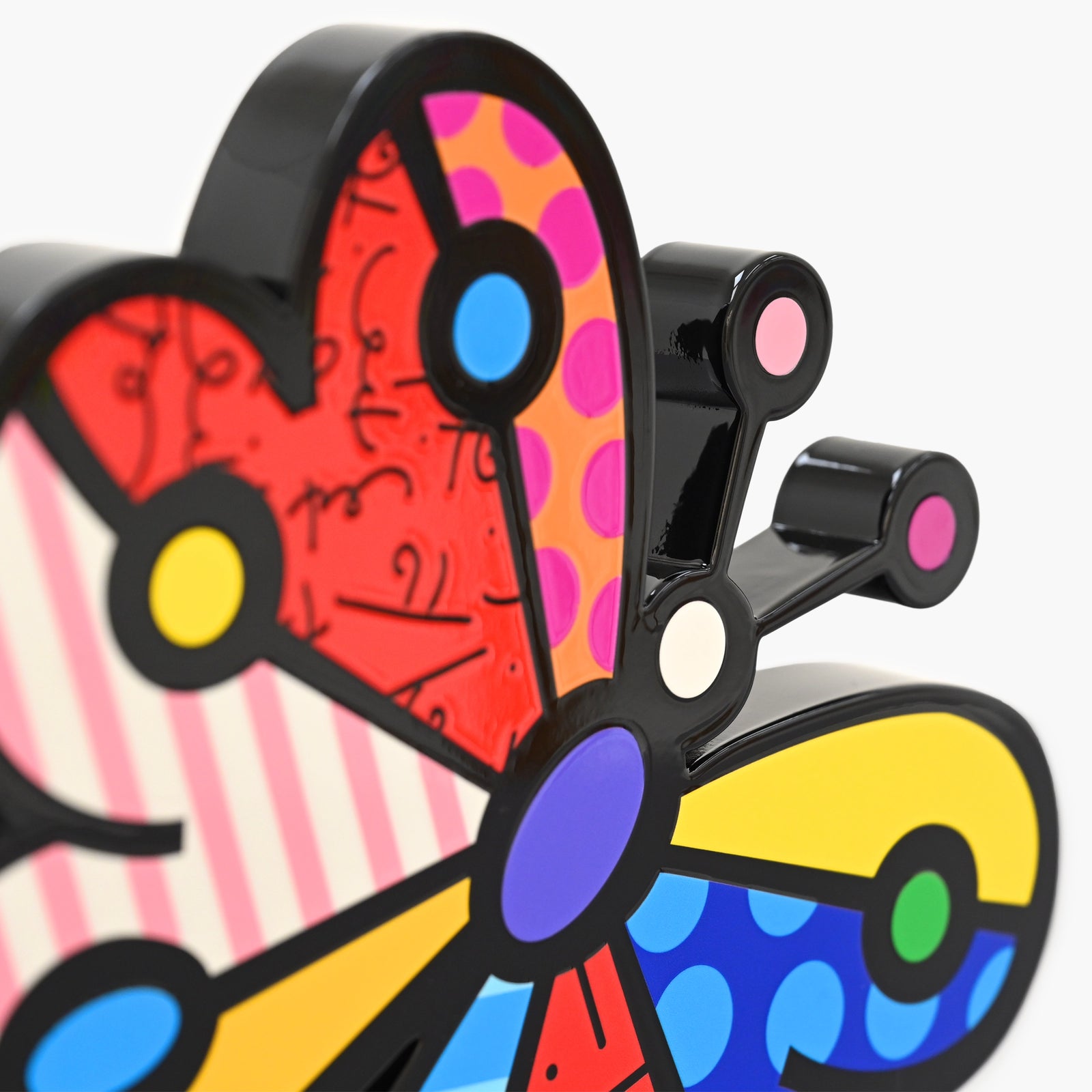 Close-up detail of Romero Britto Garden Butterfly fine art sculpture showing texture and color