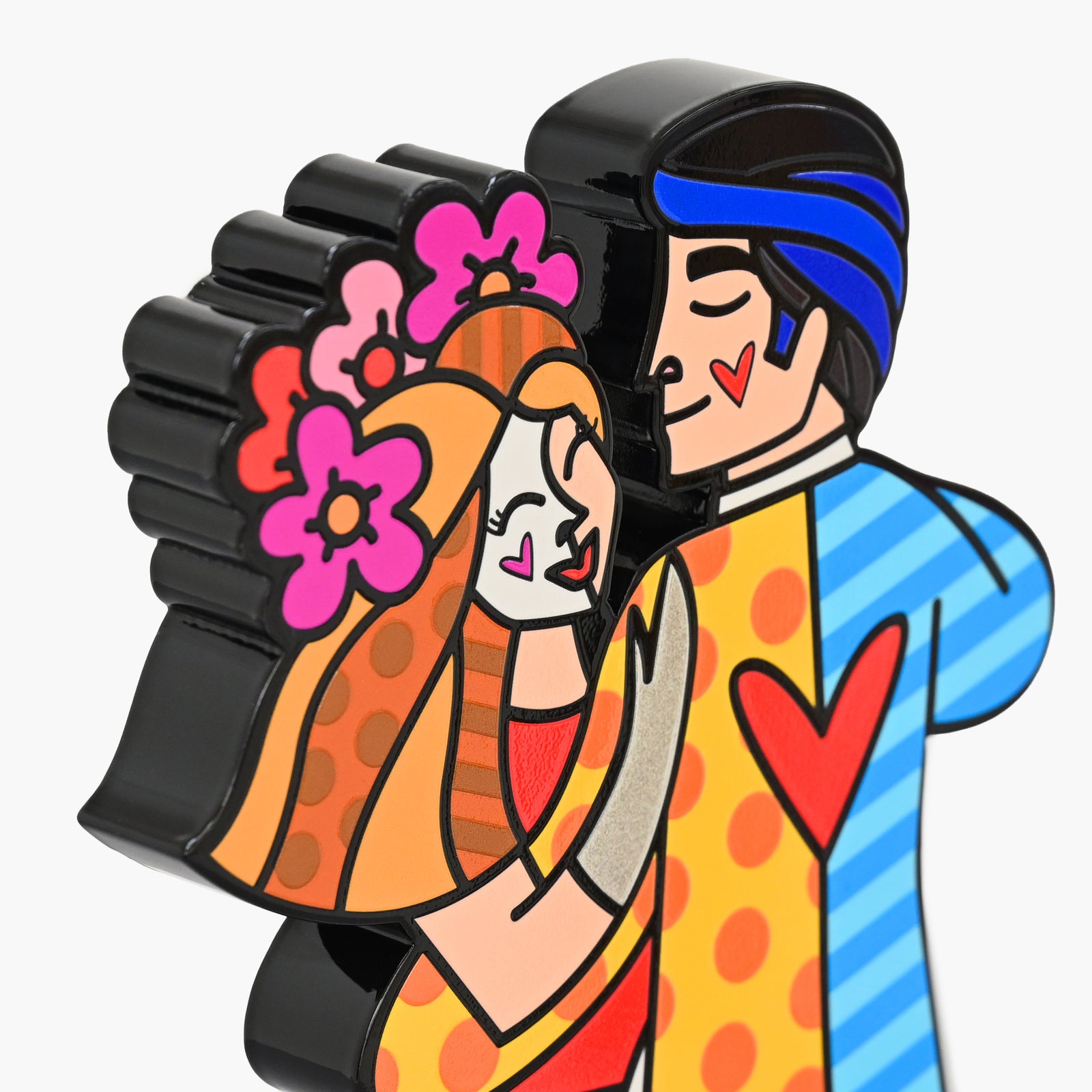 Close-up detail of Romero Britto Love Is Love fine art sculpture showing texture and color