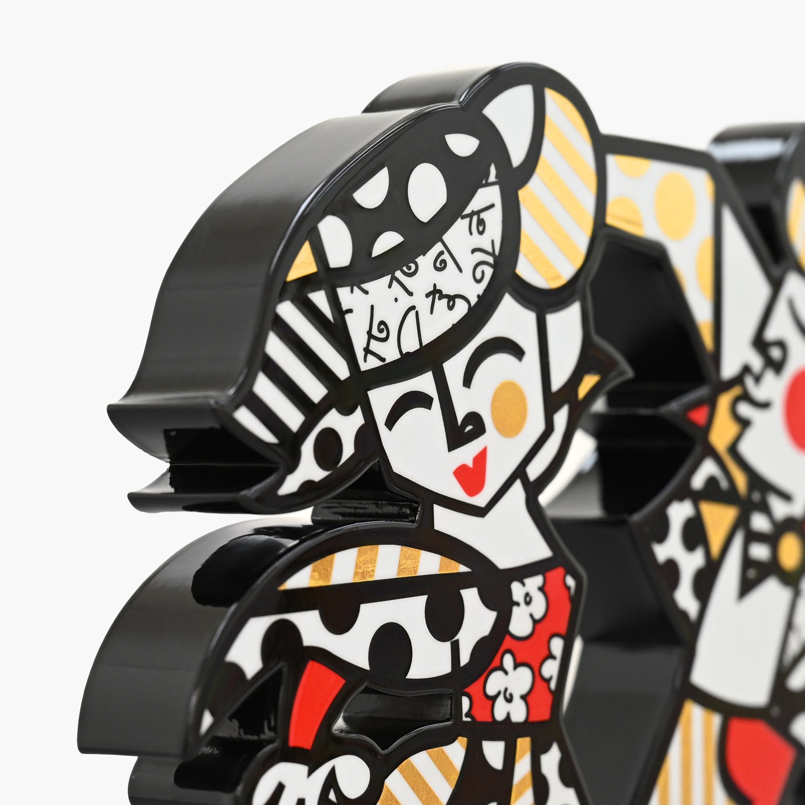 Close-up detail of Romero Britto Lets Dance fine art sculpture showing texture and color