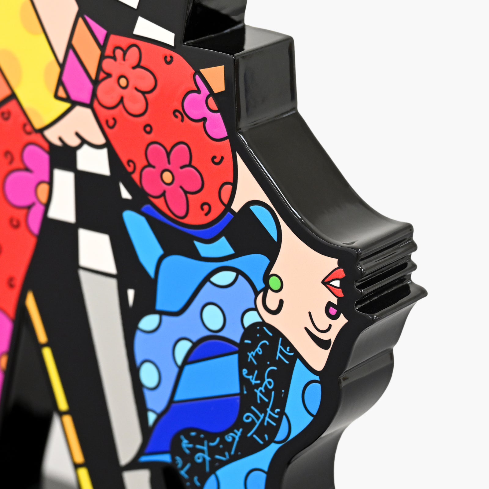 Close-up detail of Romero Britto True Love fine art sculpture showing texture and color