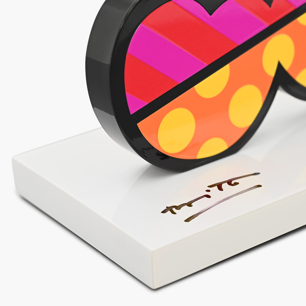 Hand signed signature on limited edition Cherries sculpture by Romero Britto