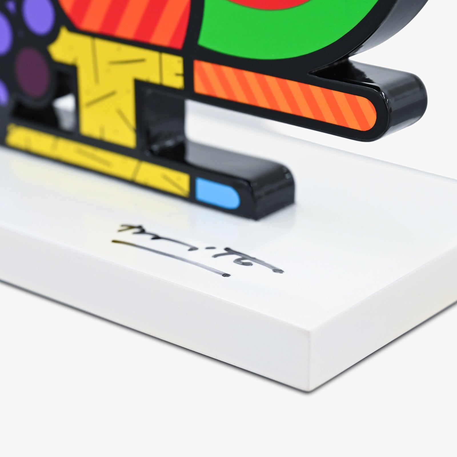 Hand signed signature on limited edition Fruit Bowl sculpture by Romero Britto